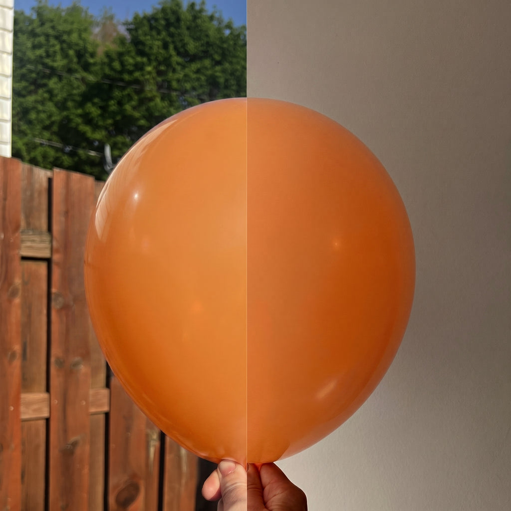 Orange balloon shown indoors and outdoors